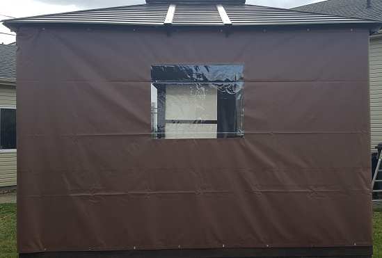 Brown gazebo tarp with windows