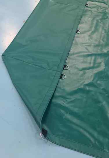 Green fitted tarp with a d-rings