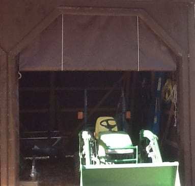 Tarp used for barn door