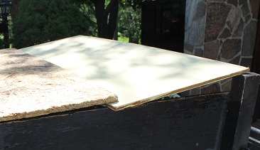 Boards used to cover utility trailer to prevent pooling