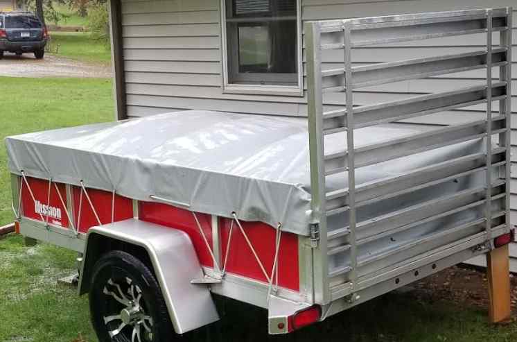 Utility trailer with a ramp